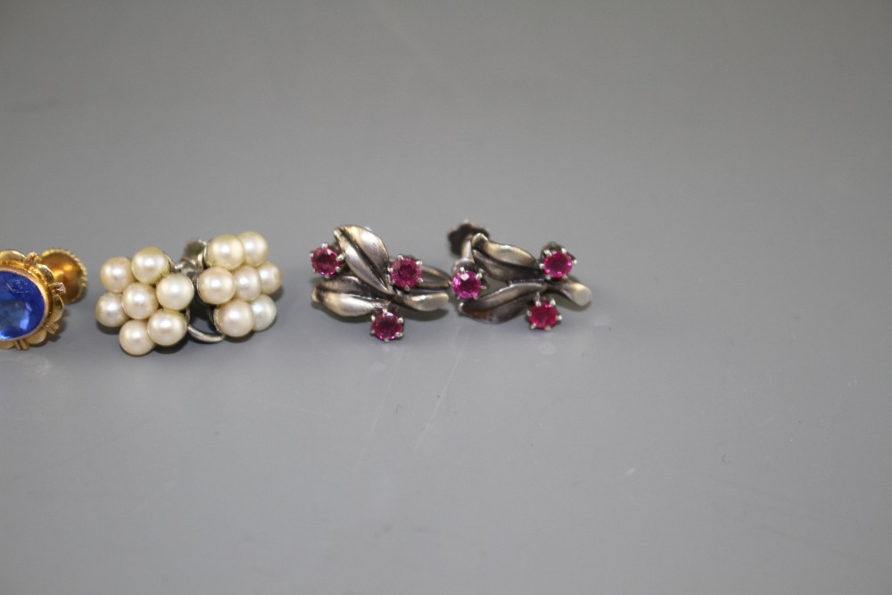Three assorted pairs of 9ct earclips, one pair set with blue paste, the others in 9ct white metal, cultured pearl